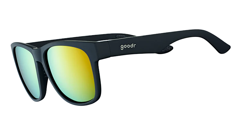 Bold round sunglasses with warm brown tint.